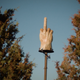 Illustration for article titled Watch a short documentary about the guy who built a giant wooden middle finger in his yard